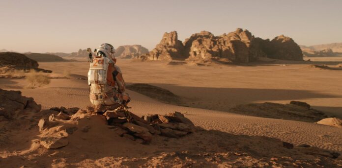 A planetary scientist checks on real-life Mars exploring